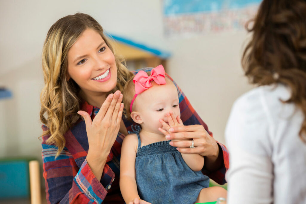 Femme enfant Bébé Signe Merci